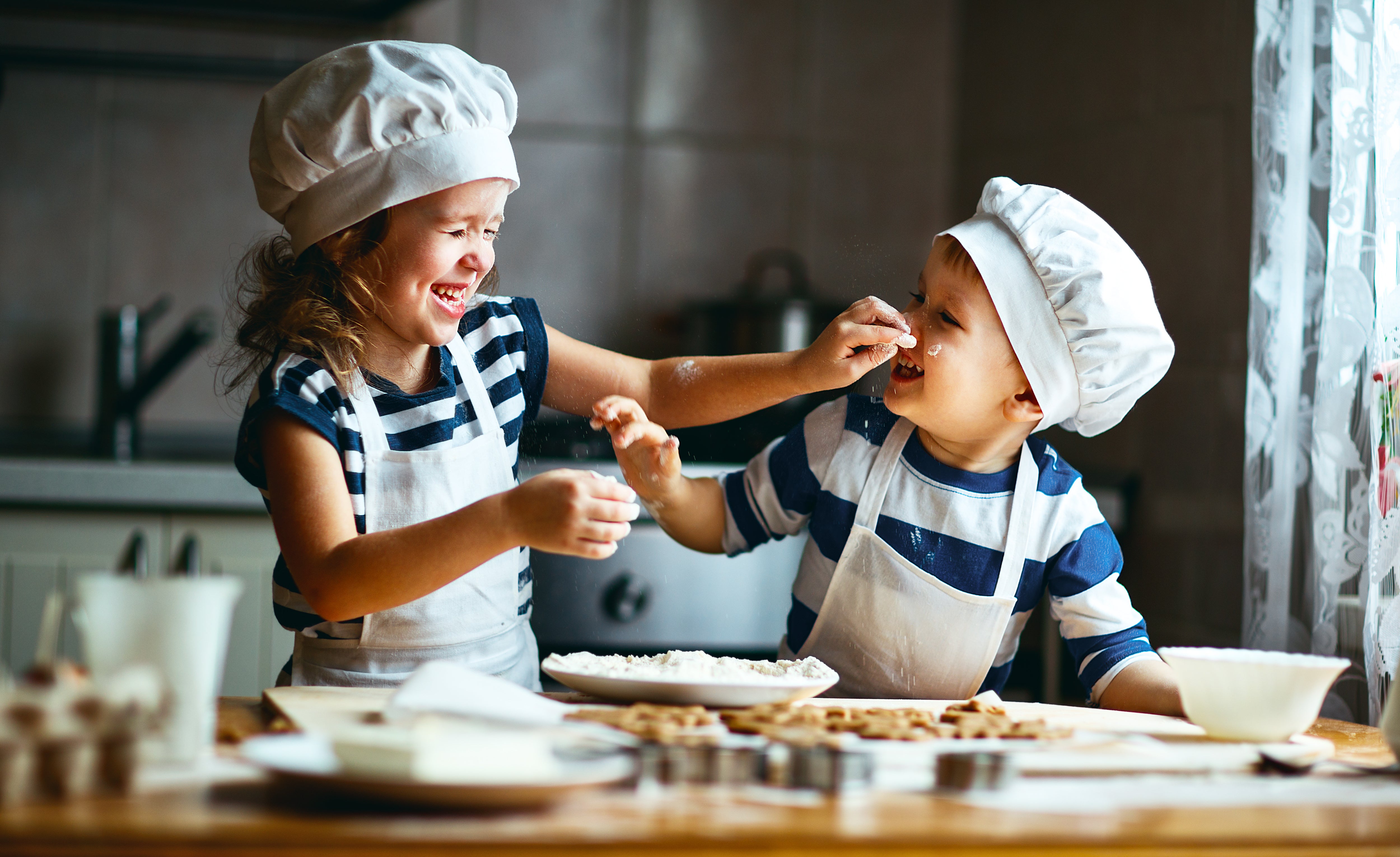 Everything To Know About Getting Rid Of Moths In Cupboard Spaces   Children Playing With Flour While Baking In The Kitchen 