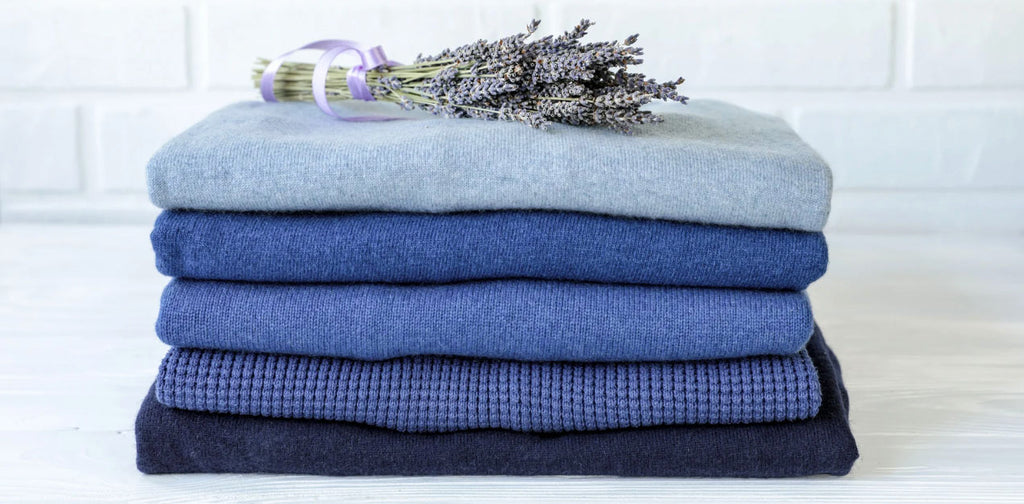 Home Wardrobe with Winter Clothes. Woolen Sweaters and Dried Lavender for  Protection from Moth Stock Photo - Image of pile, folded: 230732522